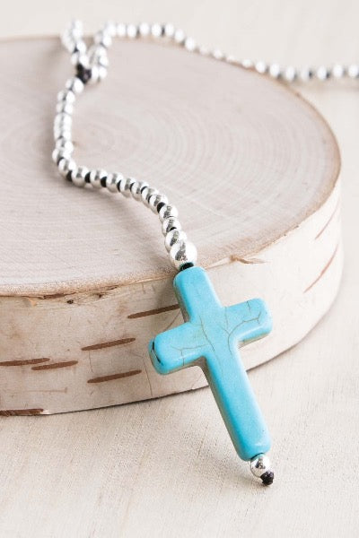 Blue stone hot sale cross necklace