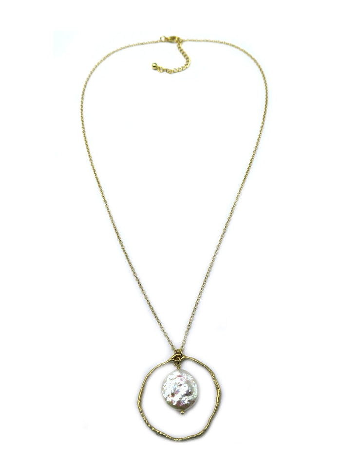 A gold chain necklace featuring a textured gold double-ring pendant with a central, irregular white pearl, displayed on a clean white background.